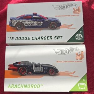 NEW Hot Wheels ID HW Charger Police Car and Arachnorod. Sealed
